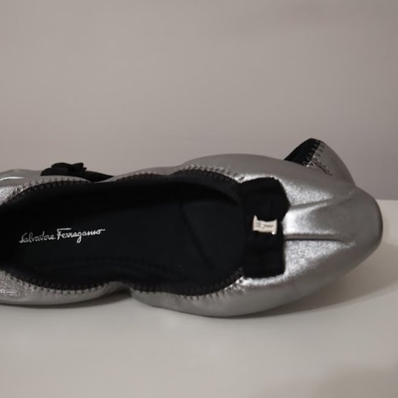 Brand New Salvatore Ferragamo Silver Flats, with black Bow, Size 7.5